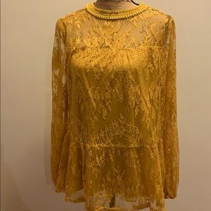 Mustard yellow lace top.